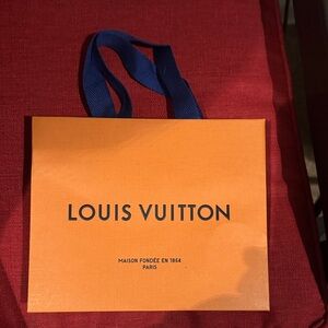 Louis Vuitton Vibrant Orange Bag with Blue Handles